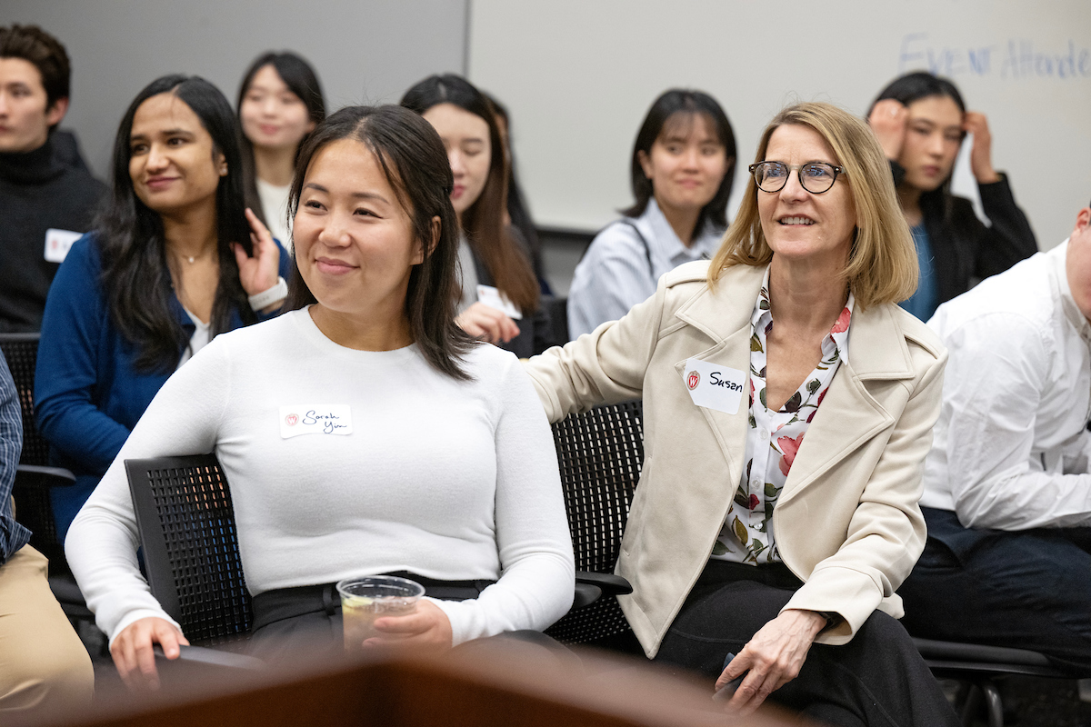 Group of event guests listening to a presentation